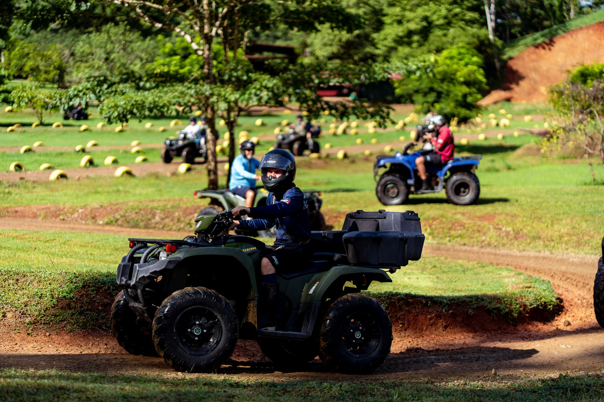 ATVs cruising the open trail at Vista Los Sueños Adventure Park
